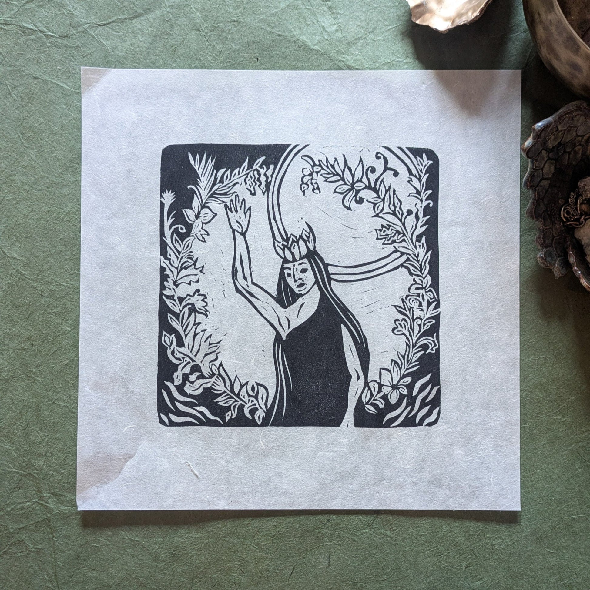 Black and white illustration of a woman with plants on a textured green surface