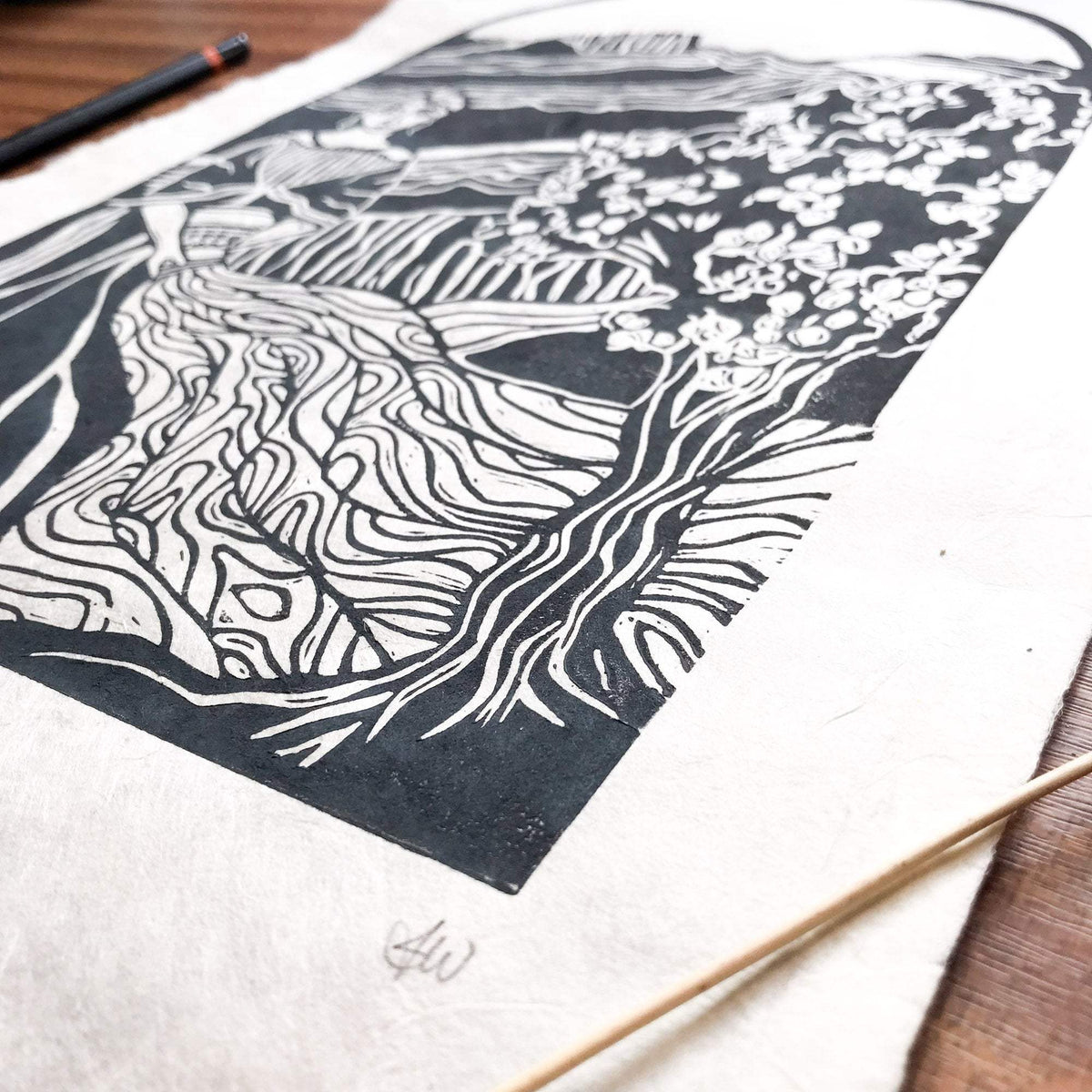 ANAHIT | ARMENIAN GODDESS linocut print in dark blue-grey, with a flowing figure and intricate floral motifs