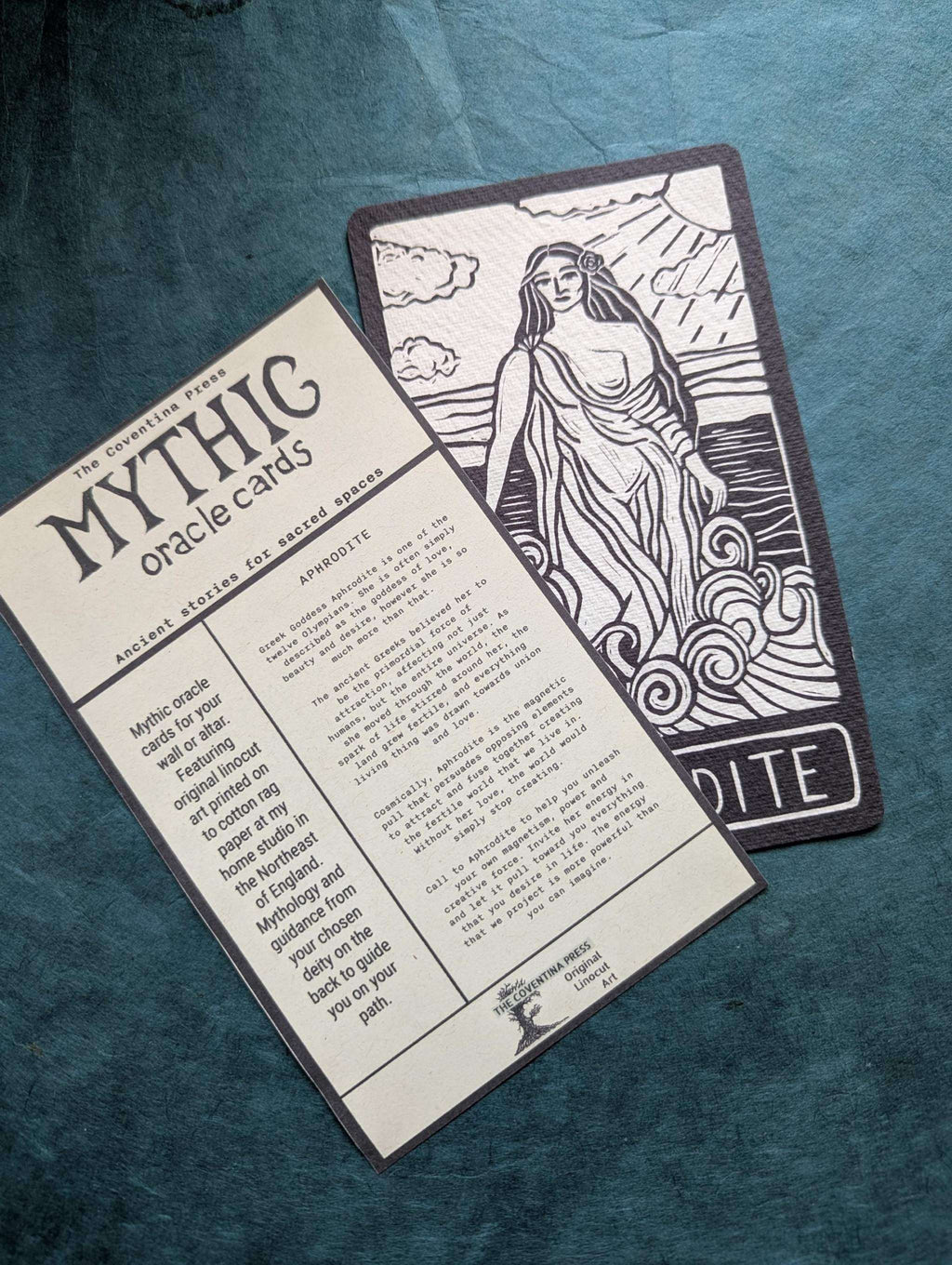 APHRODITE ALTAR CARD, a cream cotton rag oracle card with black linocut goddess artwork and printed mythology on the reverse