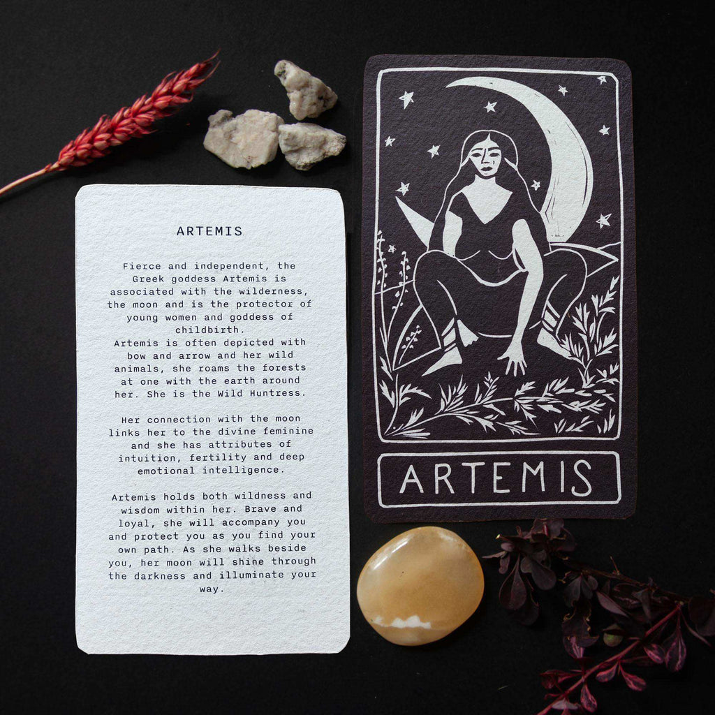 ARTEMIS ALTAR CARD in black and white linocut style, featuring a seated goddess beneath a crescent moon and stars