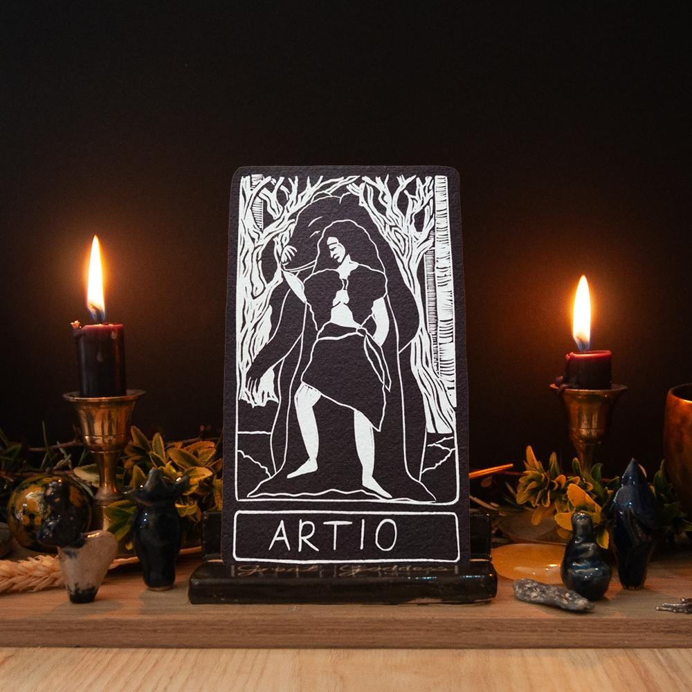 ARTIO ALTAR CARD featuring a black-and-white linocut-style figure among trees, with ARTIO lettering below