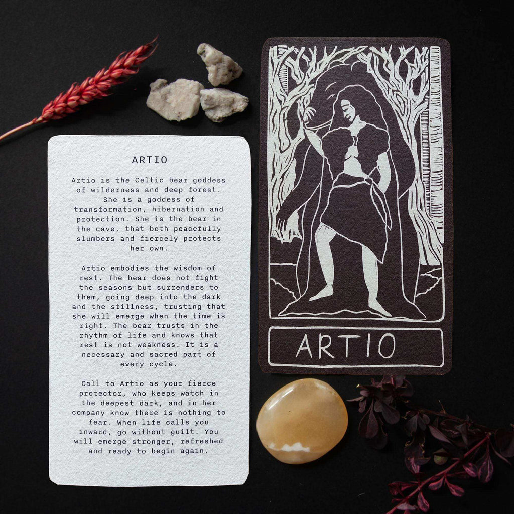 ARTIO ALTAR CARD with a black-and-white linocut of a bear goddess among trees and a printed mythology text reverse