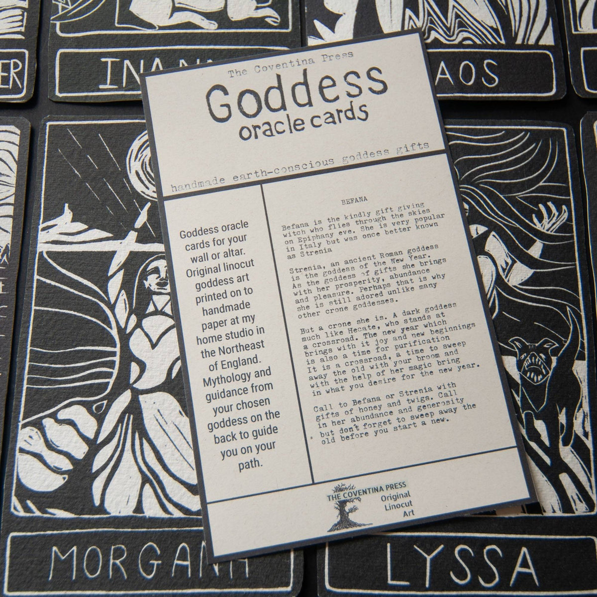 BEFANA ORACLE CARD, cream cotton rag card with dark blue linocut printing and goddess guidance text on the reverse.