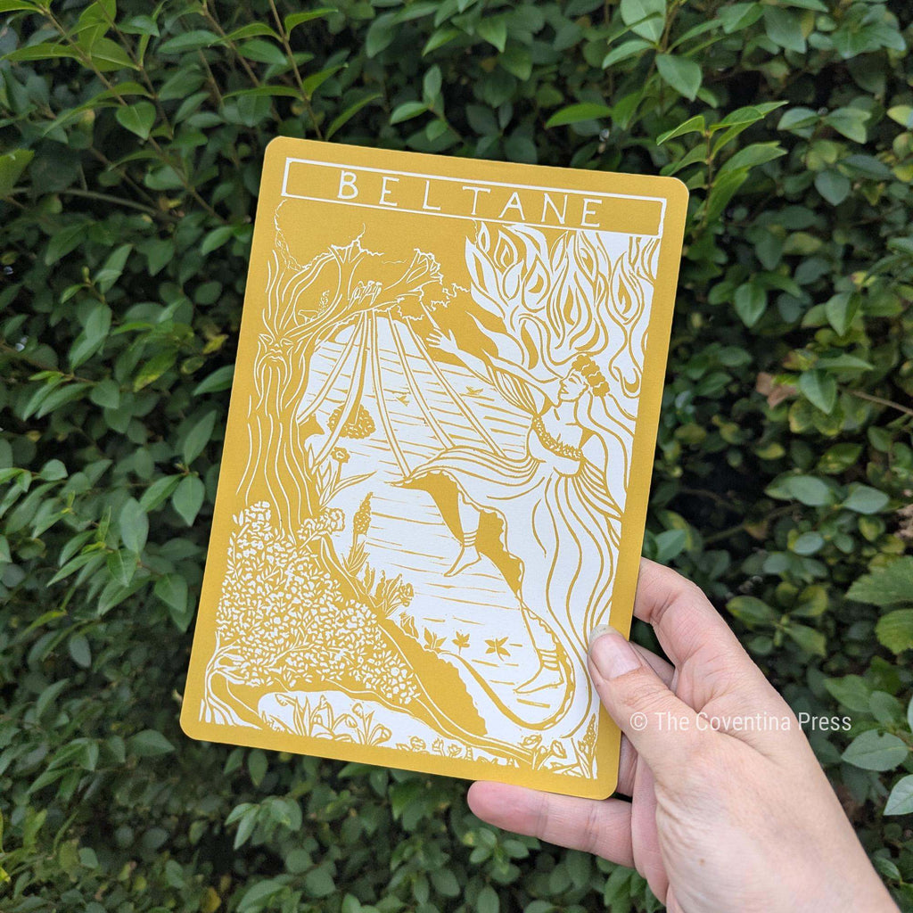 BELTANE | Altar card in mustard yellow, featuring a white linocut-style May Queen illustration and decorative lettering
