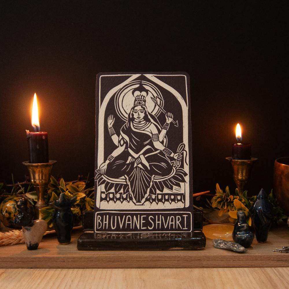 BHUVANESHVARI ALTAR CARD showing a black-and-cream linocut goddess design with a seated, multi-armed figure
