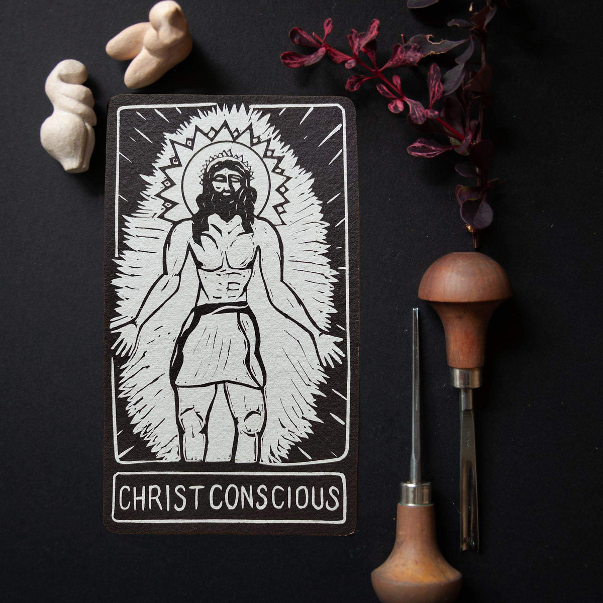 CHRIST CONSCIOUS ALTAR CARD in black and white linocut style, depicting a haloed Christ figure with radiating rays