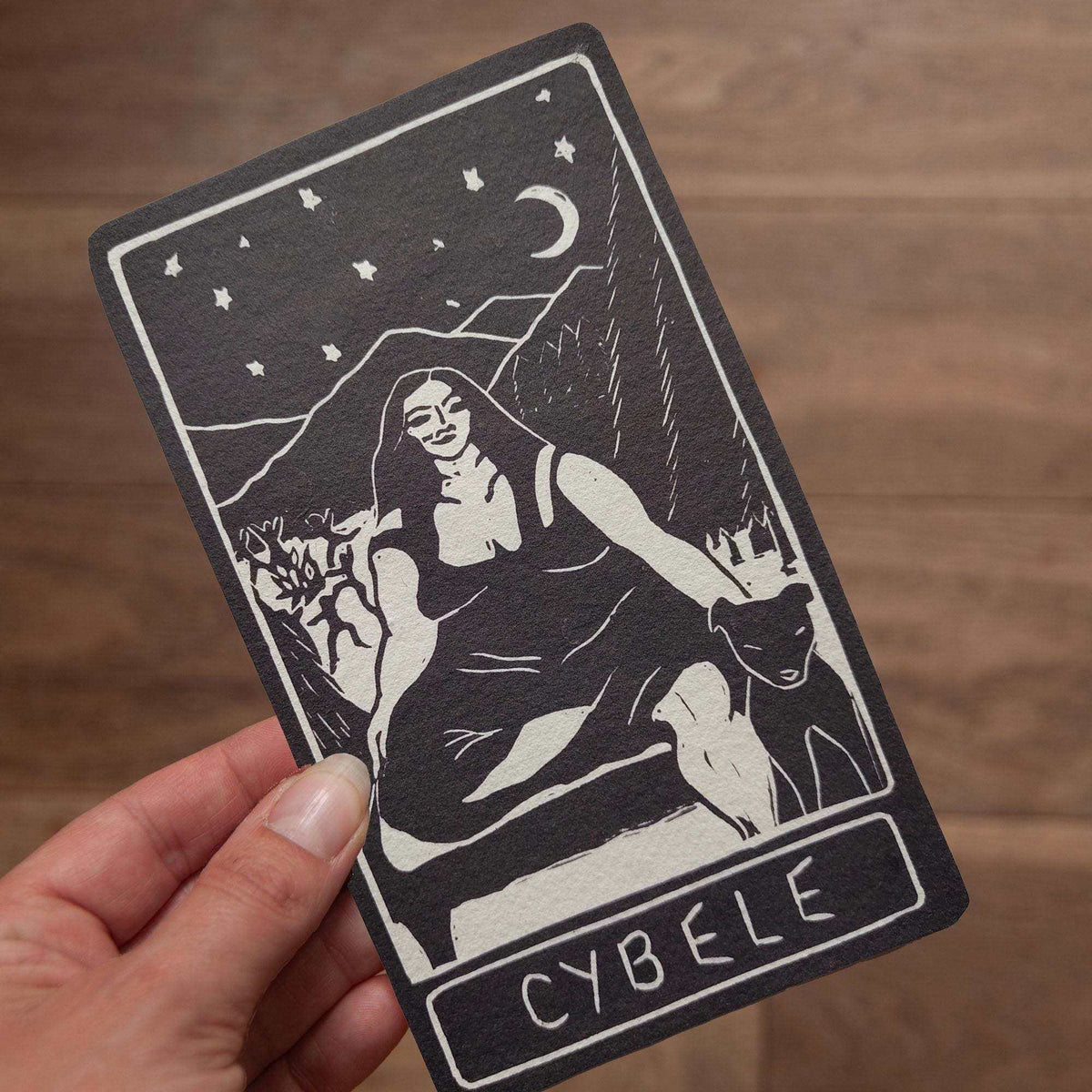 CYBELE ALTAR CARD in black and cream, featuring a linocut-style goddess seated beneath a crescent moon and stars