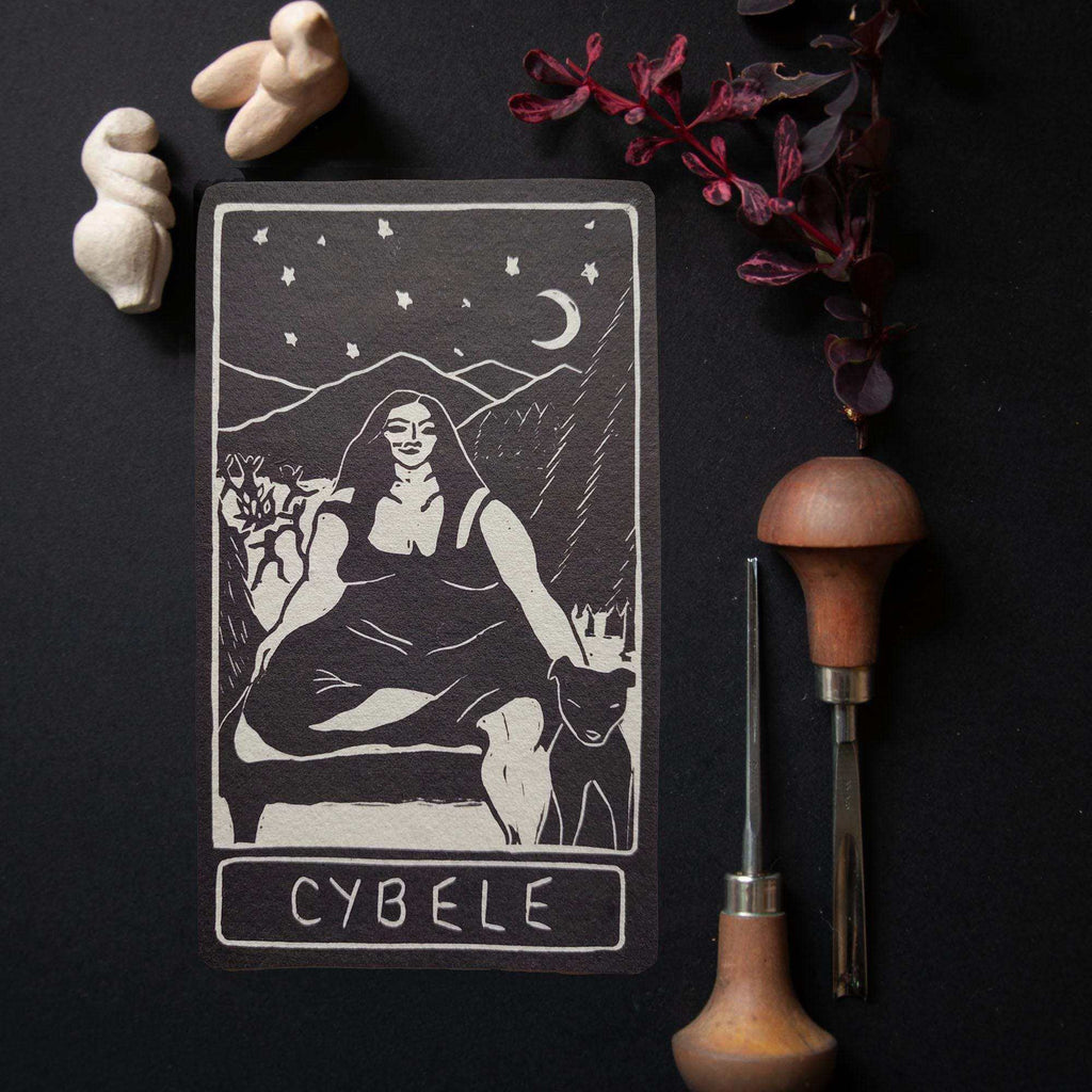 CYBELE ALTAR CARD featuring a black and white linocut of a seated goddess with a feline beneath a crescent moon