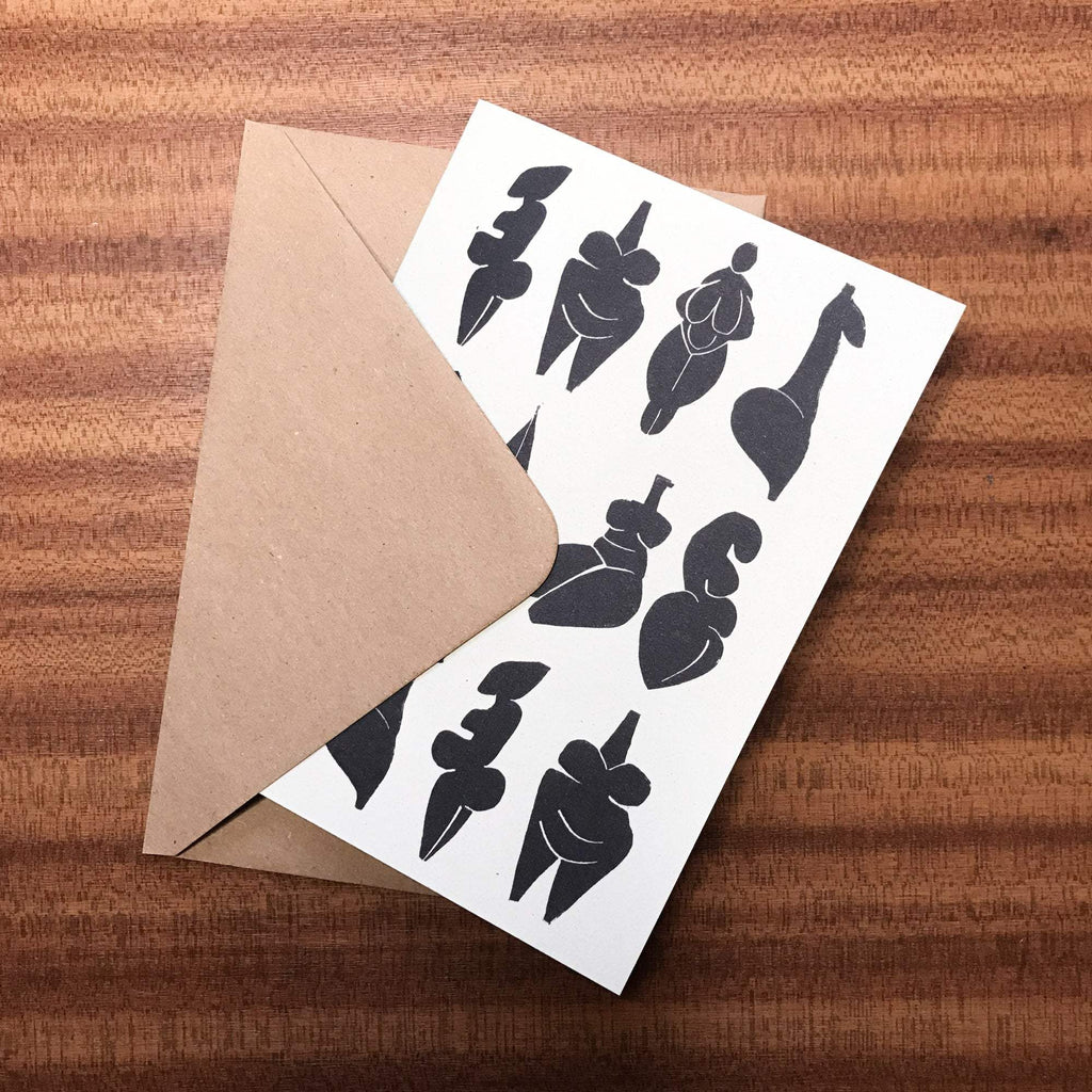 DANCING GODDESSES greeting card in white recycled cardstock with bold black linocut figures and a kraft envelope