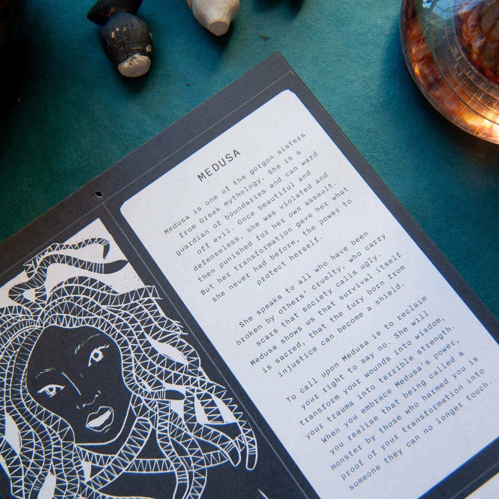 Dark Goddess Calendar 2027 page with black-and-white Medusa linocut artwork and printed mythology and guidance