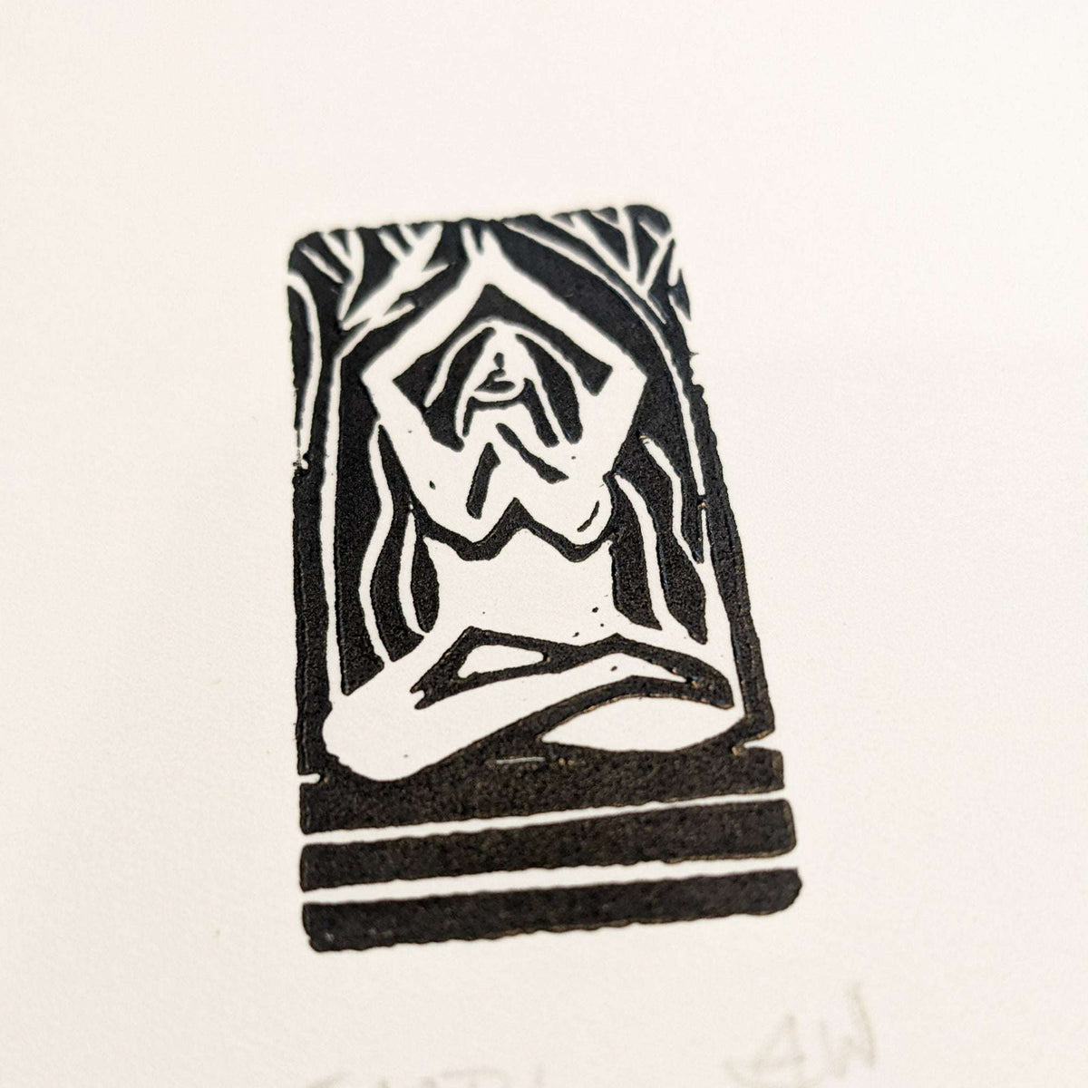 ELEMENTAL GODDESS miniature linocut print in black ink, showing a seated figure framed by flowing organic lines