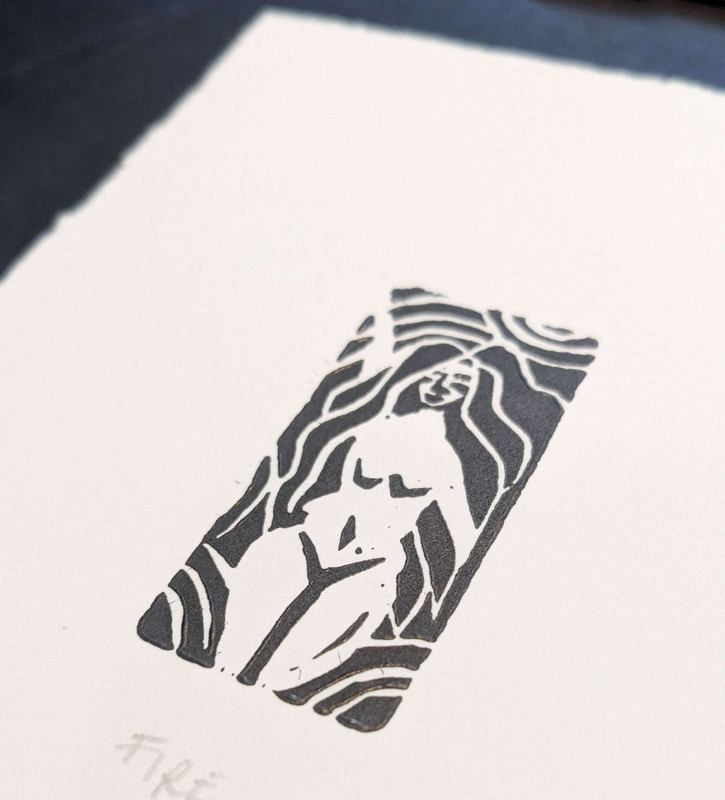 ELEMENTAL GODDESS miniature linocut print in black ink, showing a nude female figure framed by flowing, wavy lines