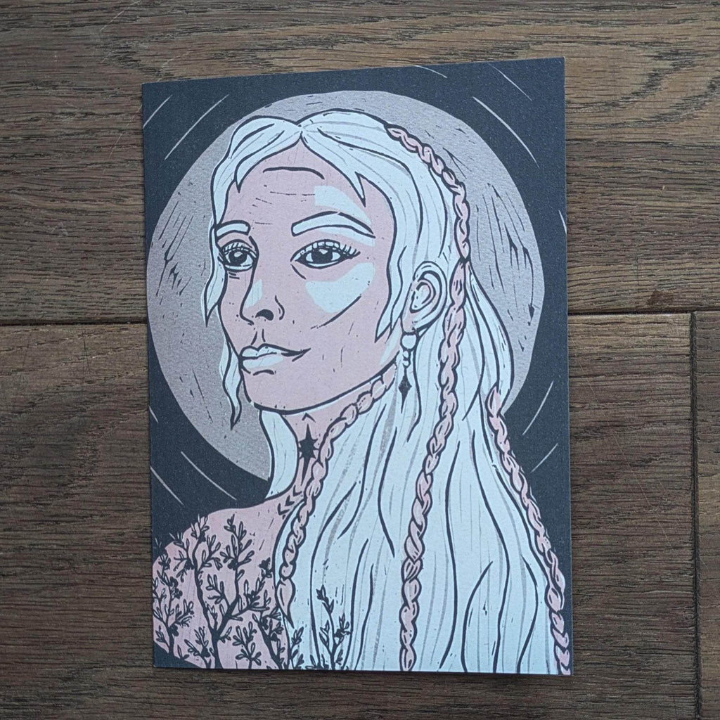 Frigg Greeting card with a pale blue linocut portrait of a braided-haired goddess on a dark navy background.