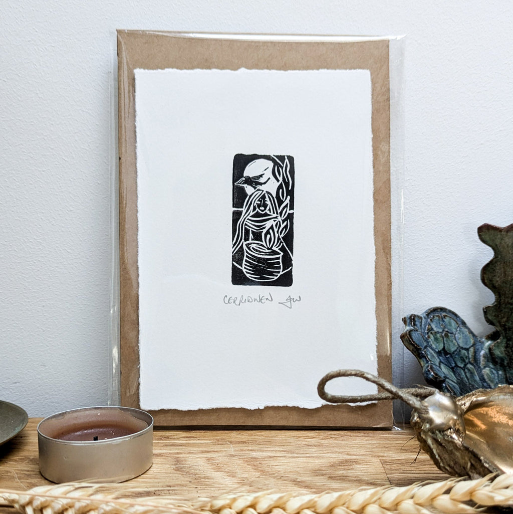 GODDESS CERRIDWEN miniature print in black ink on white paper, featuring a hand-carved figure beside a cauldron