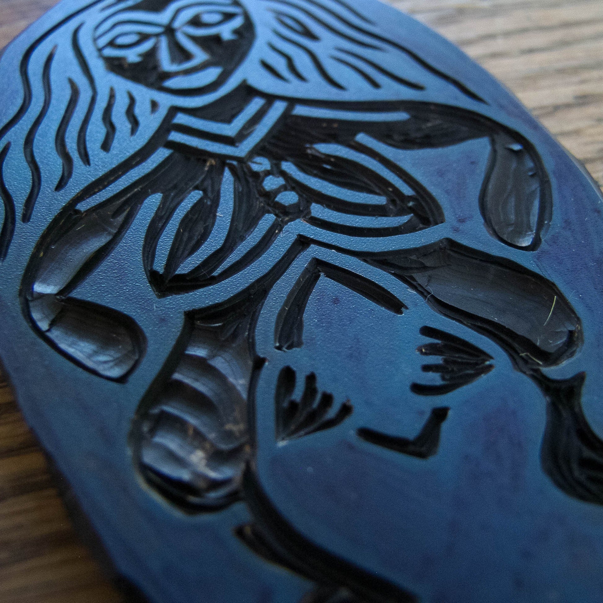image of the carved lino used to print the sheela na gig art print