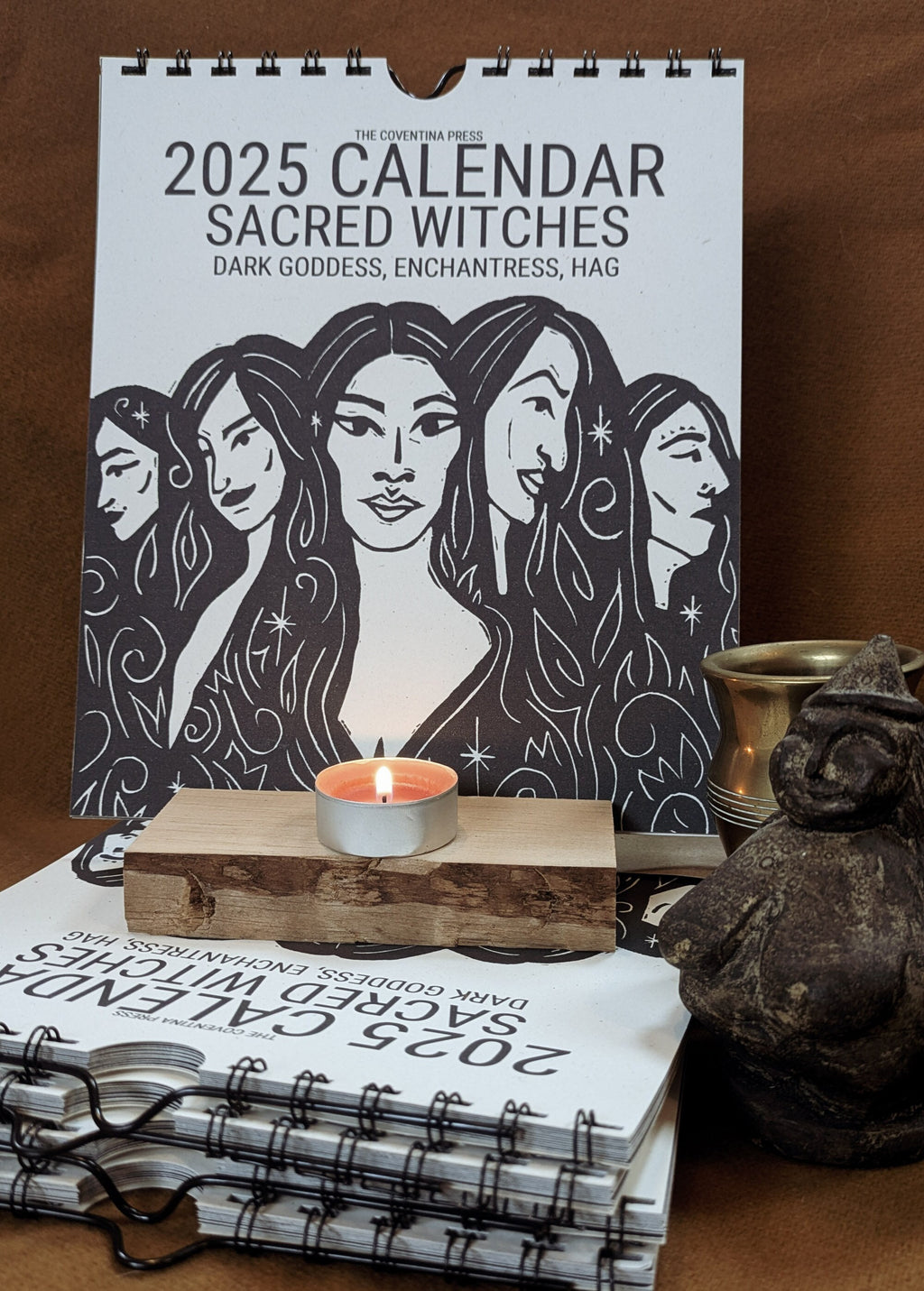 a 2025 calendar sacred witches with 5 witchy women on the front cover