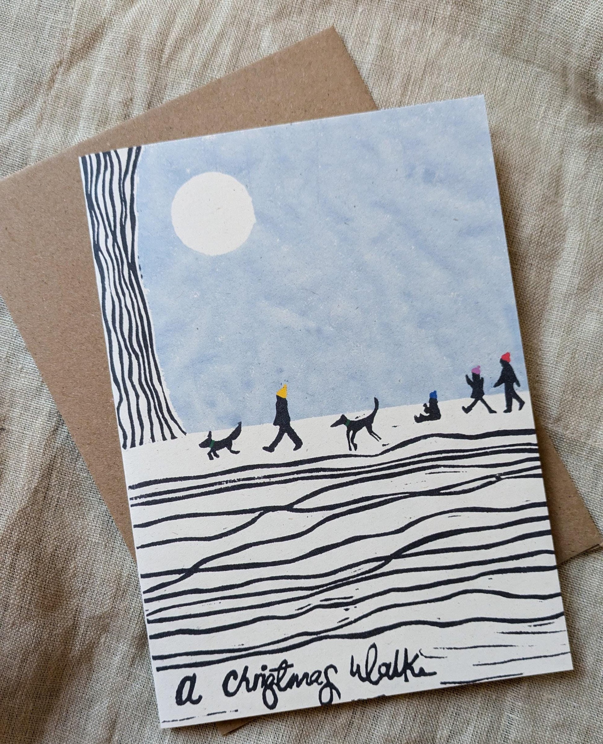 Christmas card, A Christmas Walk with Dogs, linocut card design family Christmas card with kids and dogs