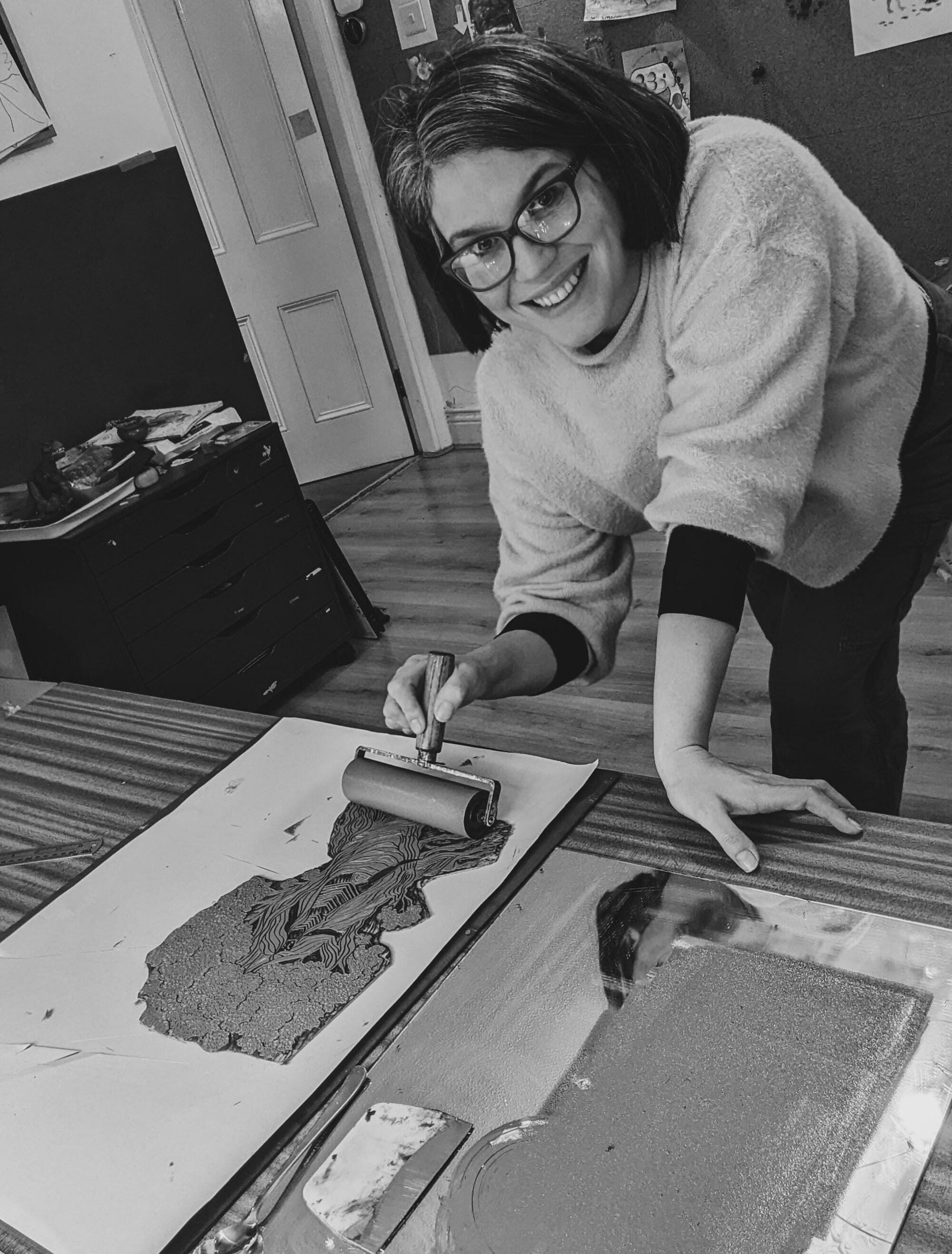 large dark green linocut print of an oak tree with dryad woman coming out the tree