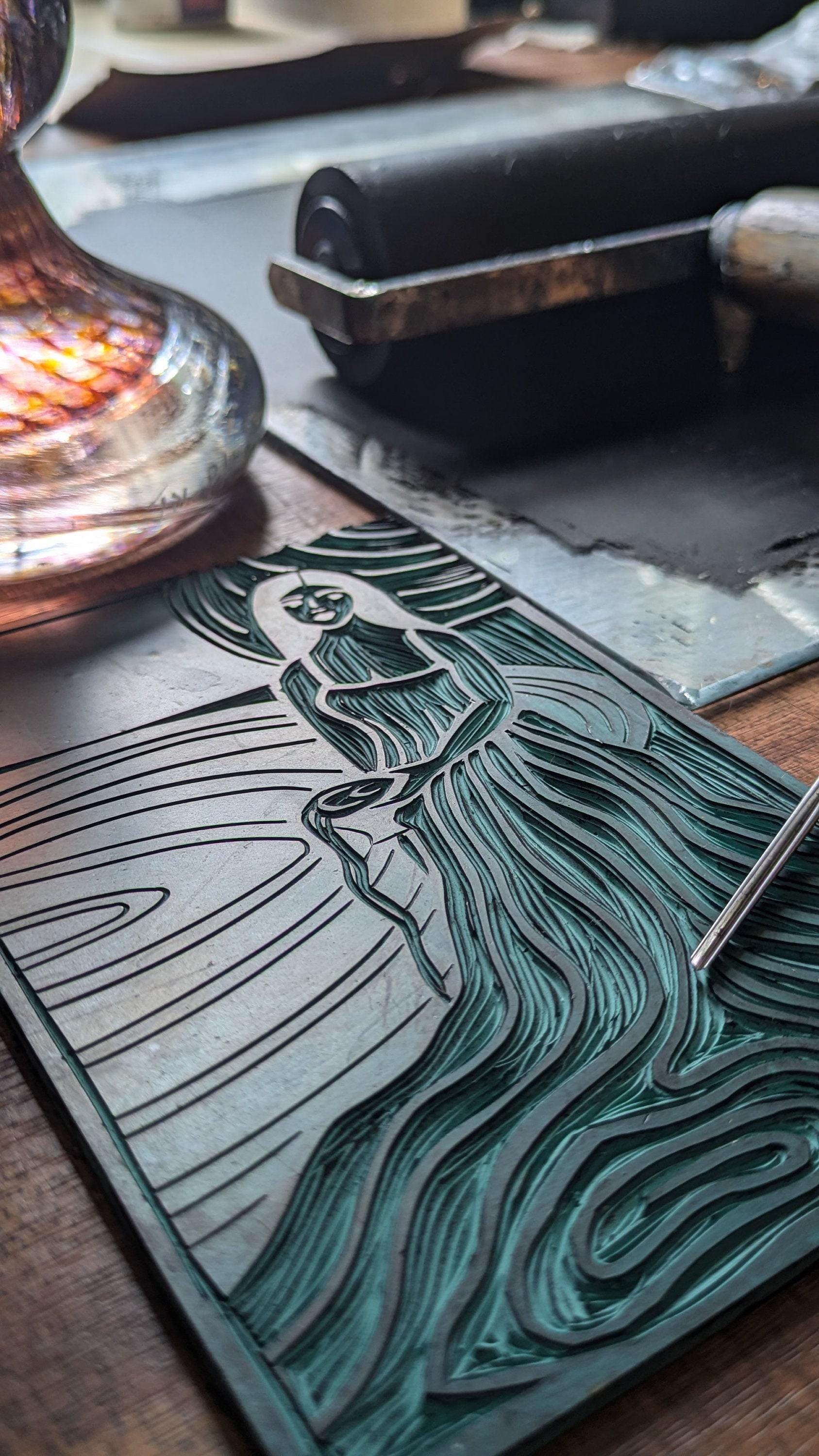 carved lino of a goddess