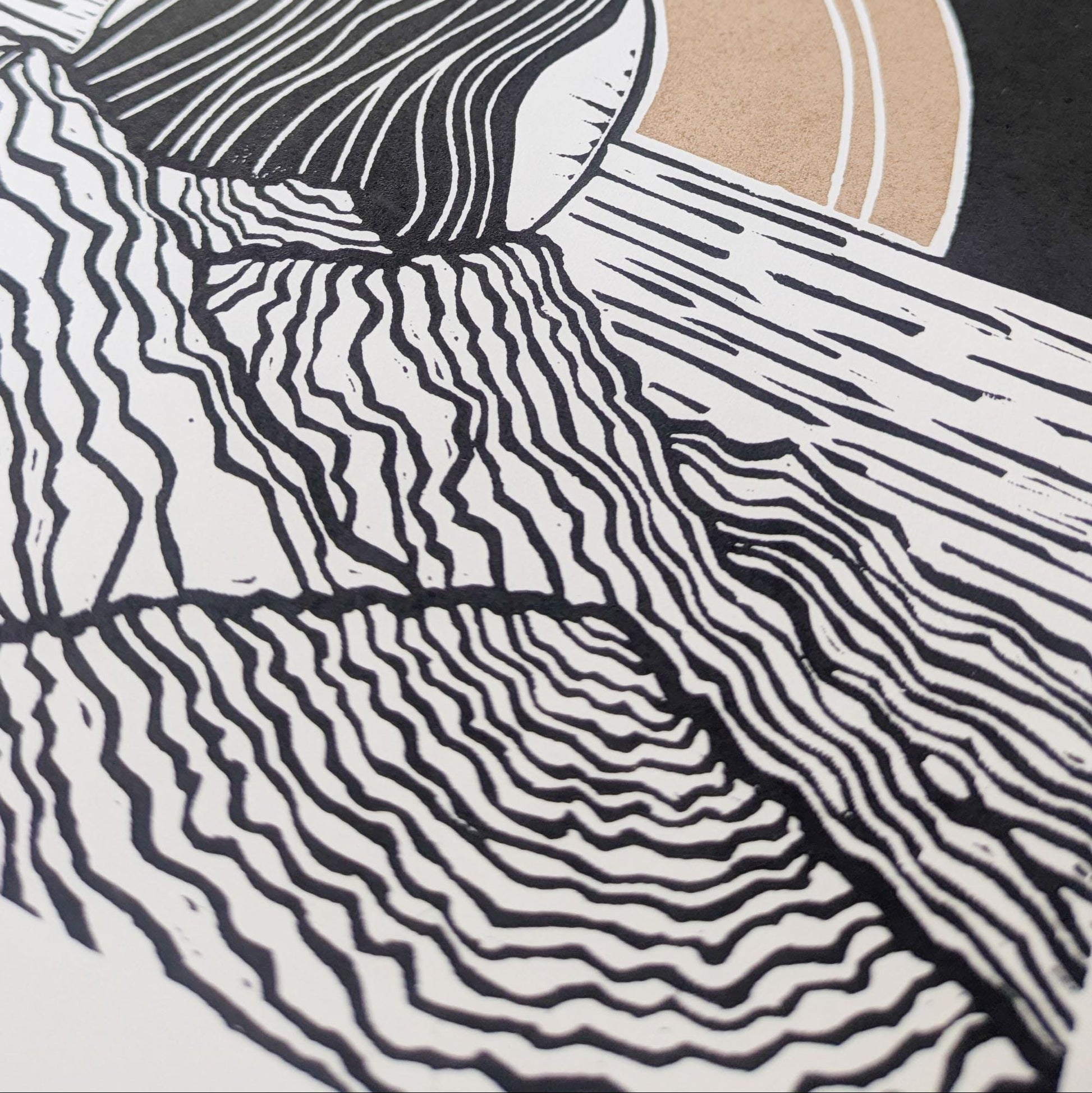 goddess sophia gold and black standing arms out in the sea