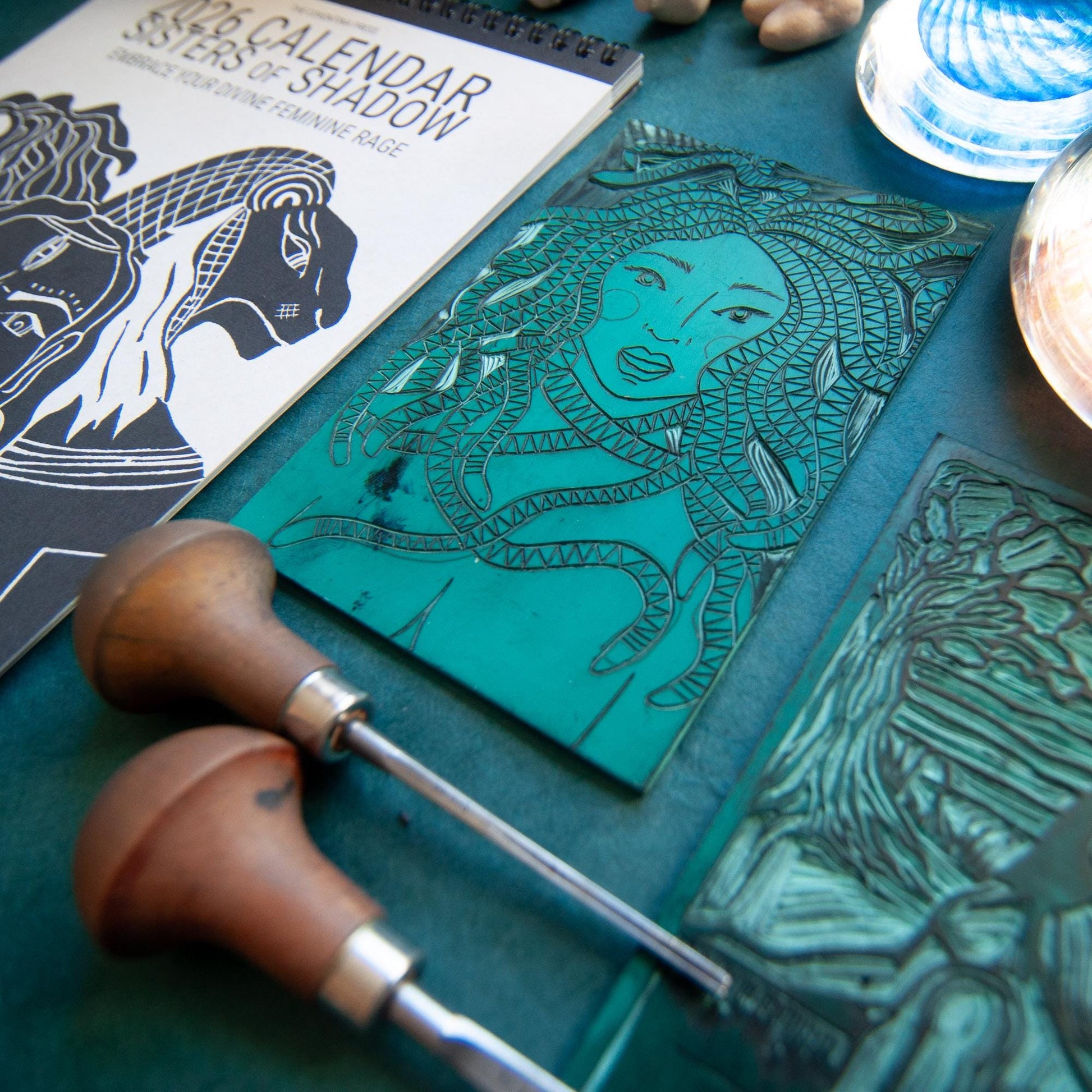 Calendar 2026, sisters of shadow - dark goddesses and feminine power. Original pagan linocut art with goddess guidance. Moon Phase calendar.