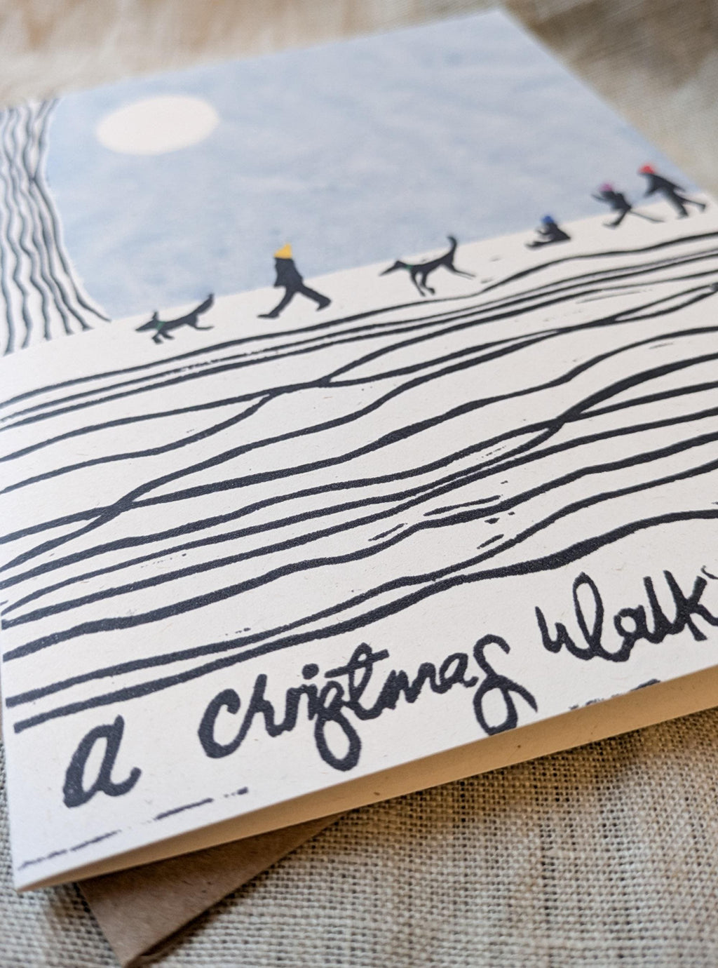 Christmas card, A Christmas Walk with Dogs, linocut card design family Christmas card with kids and dogs
