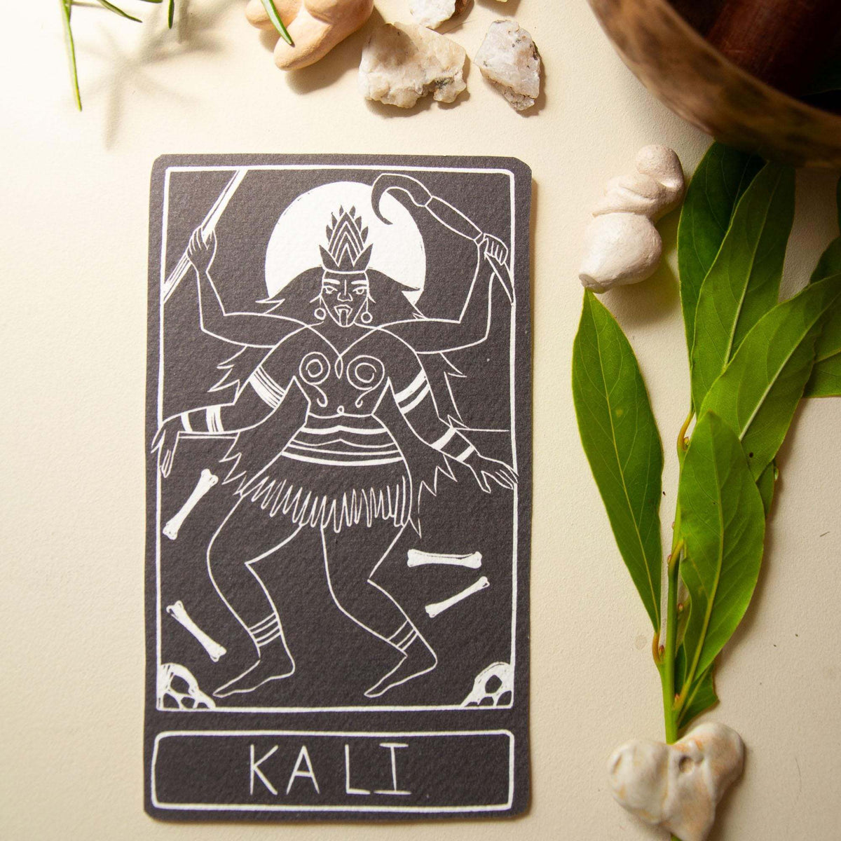 KALI ALTAR CARD with a black and cream linocut-style illustration of Kali, framed with her name below