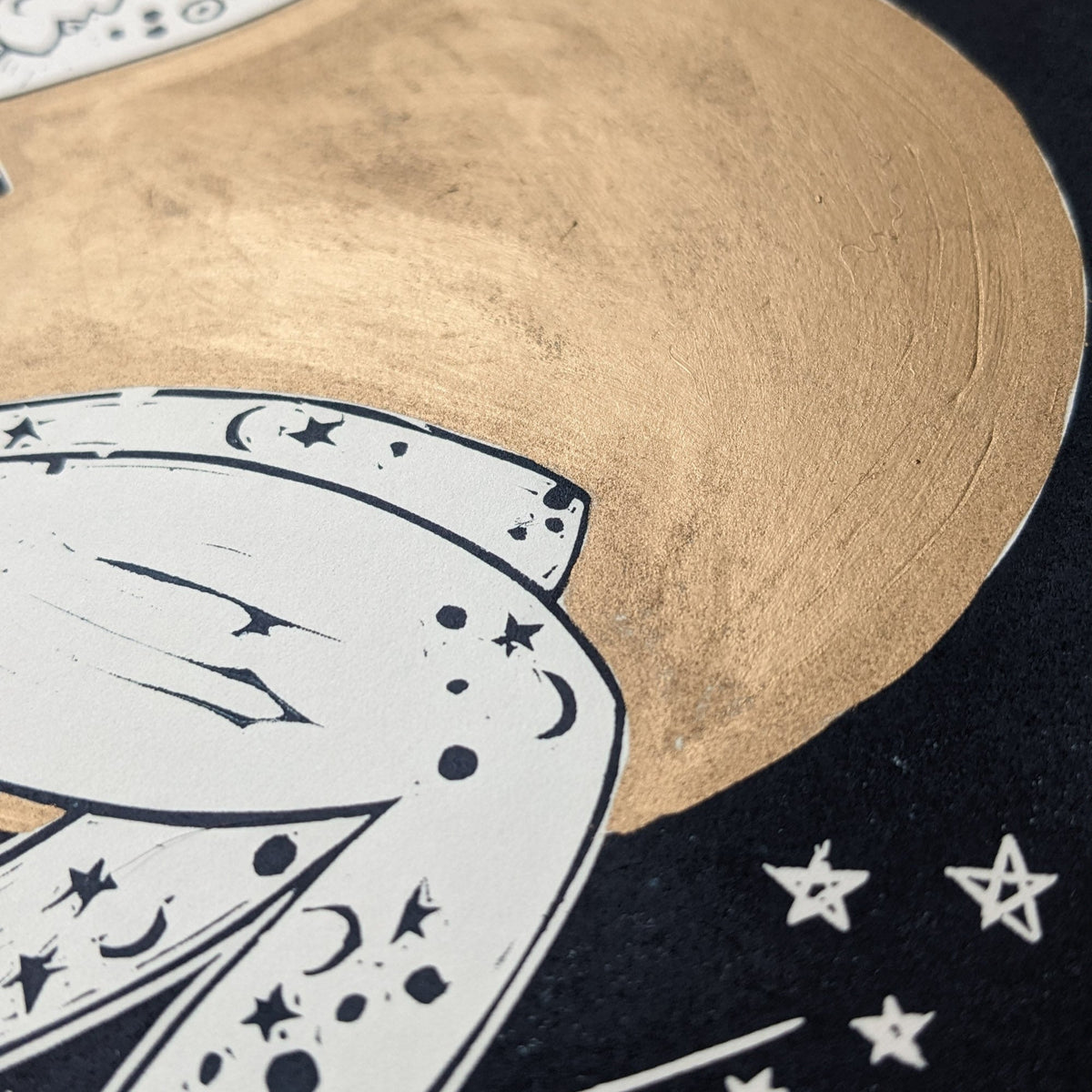 LUNA | ROMAN MOON GODDESS linocut print with a large gold moon, black starry sky and pale patterned figure