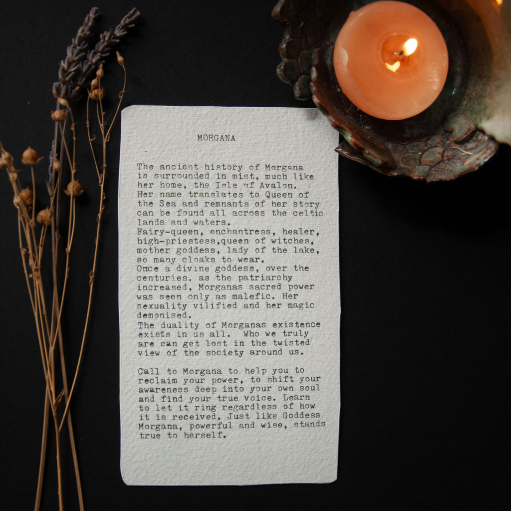 MORGANA ORACLE CARD on textured white paper, featuring black printed mythology and guidance text in a typewriter style
