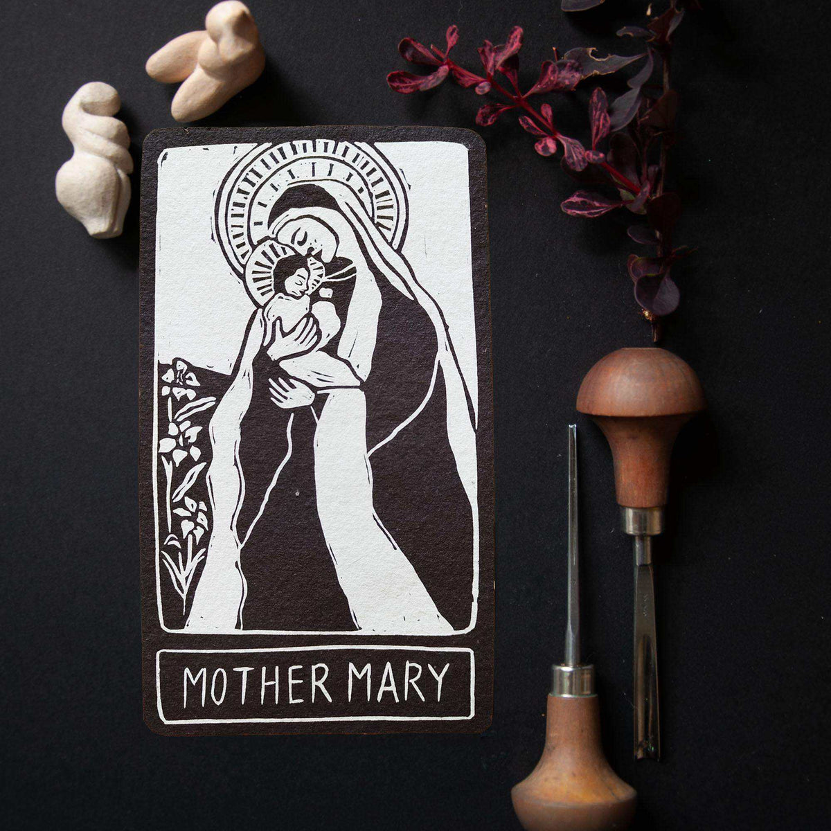 MOTHER MARY ALTAR CARD with a black-and-white linocut of Mary holding a child, framed by a halo and flowers