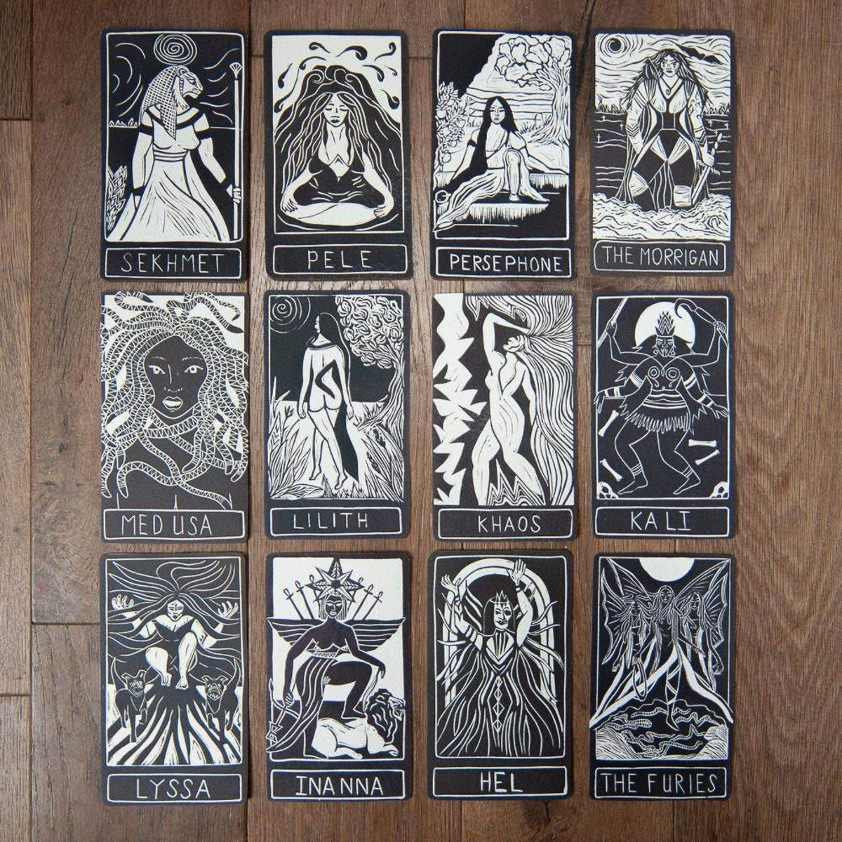 NABU ALTAR CARD featuring a black-and-white linocut-style figure with flowing lines and an ornate border