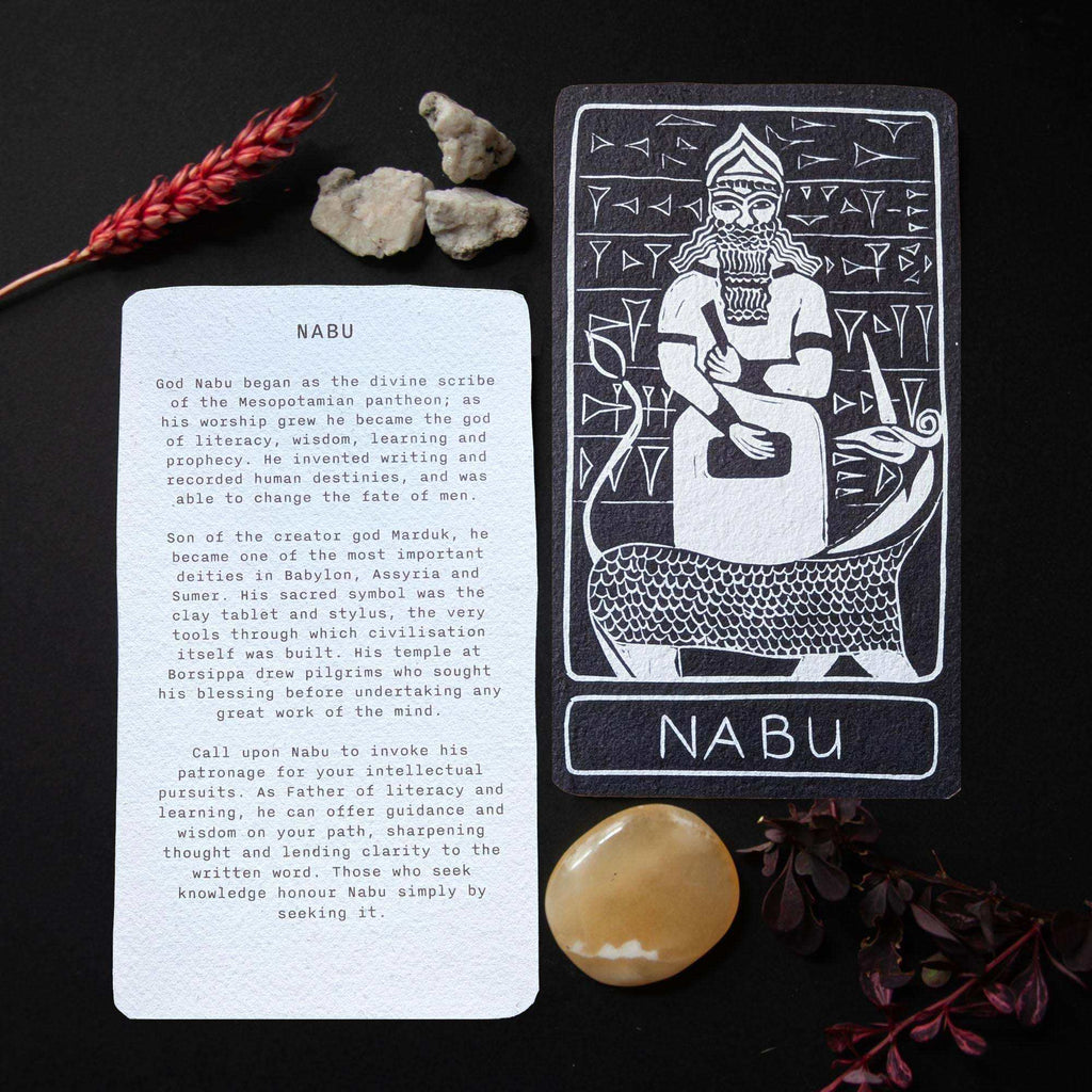 NABU ALTAR CARD showing a black-and-white linocut of a seated, bearded figure with a fish tail, plus a text reverse