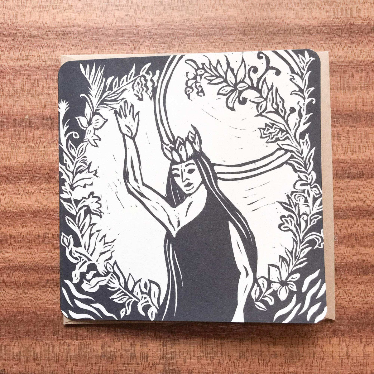 Greeting card with QUEEN ELPHAME in a black and white linocut, showing a crowned woman among leafy branches