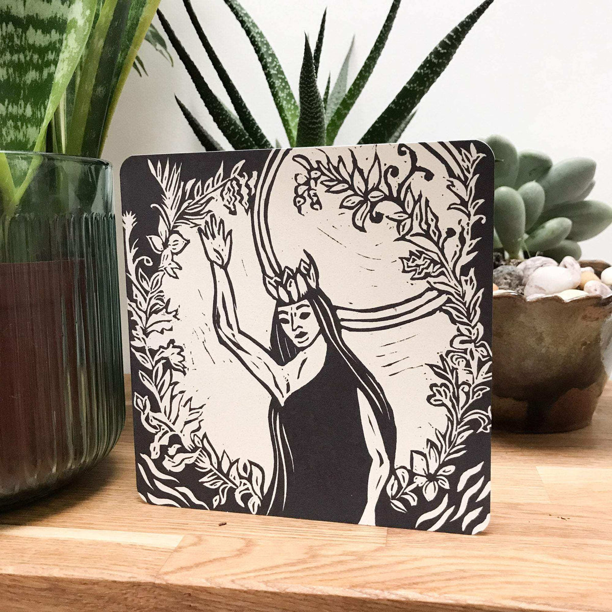 QUEEN ELPHAME greeting card with a black and cream linocut of a crowned woman framed by leafy flowers