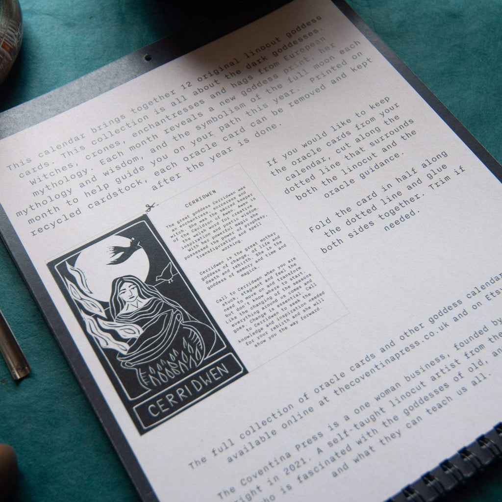 SACRED WITCH calendar page with a black-and-white linocut of Cerridwen, mythology text and metal spiral binding
