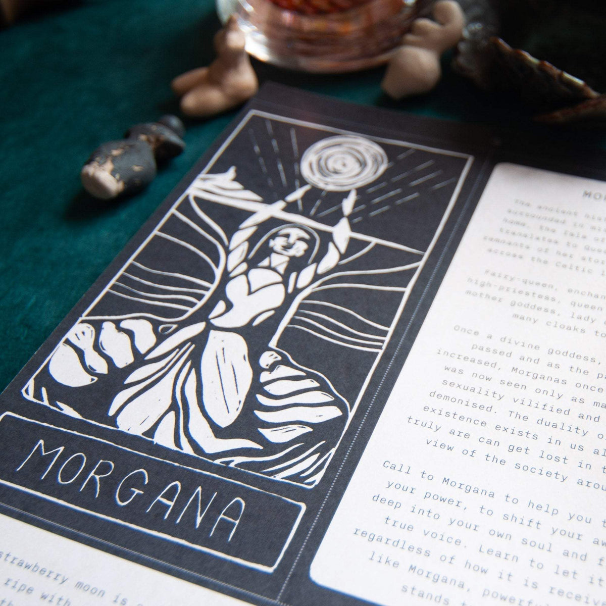 SACRED WITCH 2027 calendar with a black-and-white linocut of a goddess beneath a moon and spiral binding