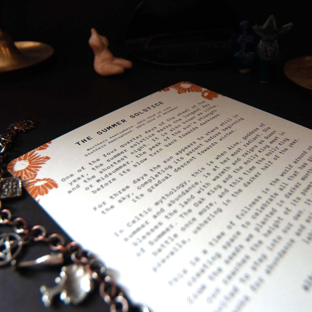 SUMMER SOLSTICE altar card with cream cardstock, black printed text and orange sunburst linocut motifs