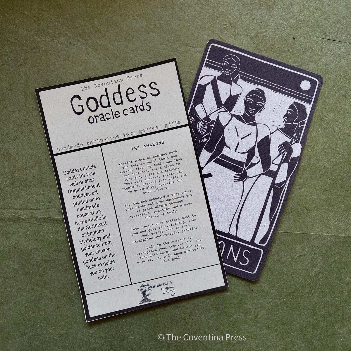 THE AMAZONS ALTAR CARD, black and white oracle card with a linocut of three warrior women and printed mythic guidance
